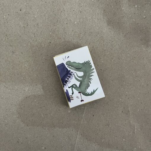 zápalky Krokodýl u piana